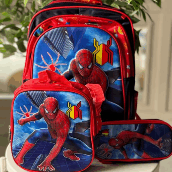 Red and black Spider-Man 3-piece set including a school backpack, insulated lunch tote, and zip-around pencil case with 3D graphics against a city skyline