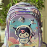 Pastel watercolor galaxy backpack with a 3D embossed front panel featuring Kuromi in an astronaut spacesuit floating amongst planets and UFOs