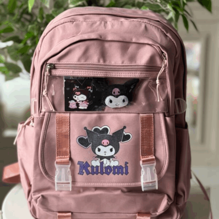 Muted dusty rose pink backpack featuring a Kuromi print with buckle flap and a clear top zippered display window with pins and plushies