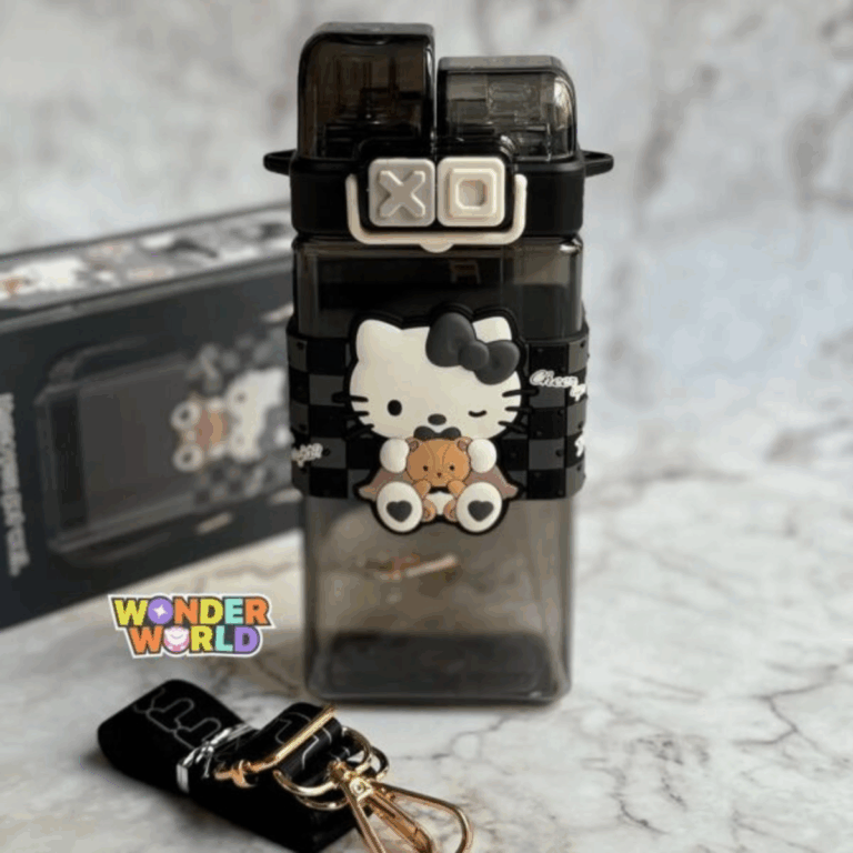 A square-shaped dual-compartment water bottle in translucent smoky charcoal black, wrapped in a black-and-grey checkered silicone sleeve with a 3D winking Hello Kitty wearing a black bow and holding a tiny brown teddy bear, secured by a cream-colored clasp with dark grey "XO" push buttons
