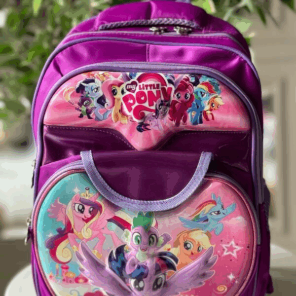 Vibrant magenta and purple My Little Pony backpack with 3D graphic panels featuring Twilight Sparkle, Rainbow Dash, Pinkie Pie, Spike, and friends