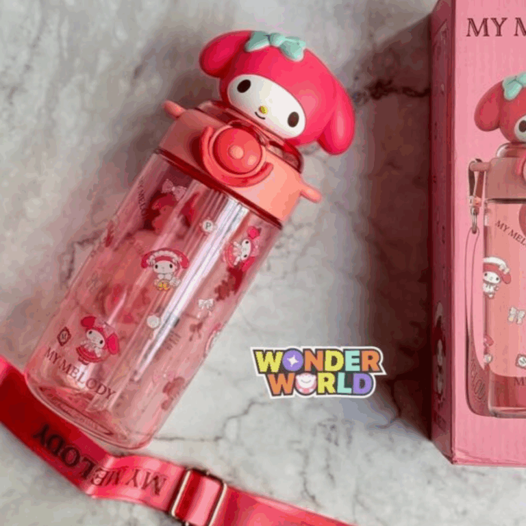 A translucent pink water bottle printed with various cute My Melody graphic motifs, featuring a unique 3D sculpted lid shaped like My Melody's head with a pastel mint-green bow, shown next to its pink packaging and matching adjustable shoulder strap with gold-toned clips