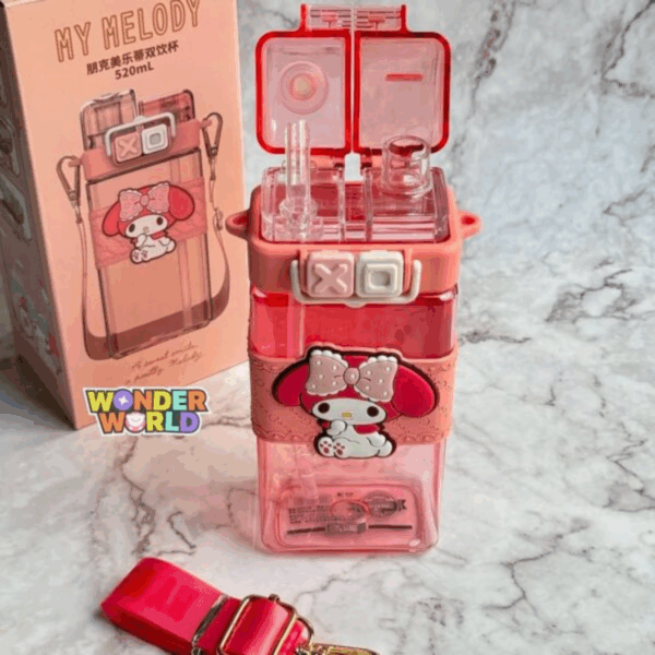 A square-shaped dual-compartment water bottle in translucent coral pink, wrapped in a peach-pink lace-textured silicone sleeve with a 3D sitting My Melody wearing a pink polka-dot bow, secured by a cream-colored clasp with pastel pink and white "XO" push buttons