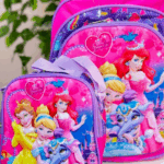 Bright magenta pink Disney Princess backpack and matching insulated lunch bag featuring Ariel, Cinderella, Belle, and Jasmine