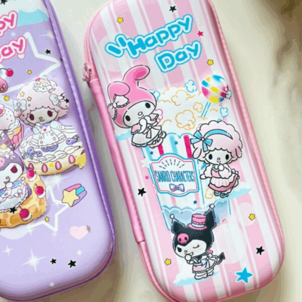 A close-up view of two protective, hard-shell zippered pencil cases; one features a pastel lavender background with My Melody, Kuromi, and My Sweet Piano relaxing alongside delicious waffles and cupcakes, while the other features a pink-and-white candy-striped backdrop showing the characters next to a giant striped popcorn tub under the blue cursive script "Happy Day"