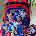 Royal blue and red 3-piece Sonic the Hedgehog set featuring a school backpack, insulated lunch tote, and pencil case with 3D graphics of Sonic, Tails, and Knuckles