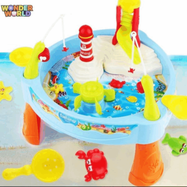 A colorful blue and orange plastic water activity play table for kids featuring a central water wheel, a red and white lighthouse, a yellow slide, fishing rods with hooks, and loose sea creature toys scattered below