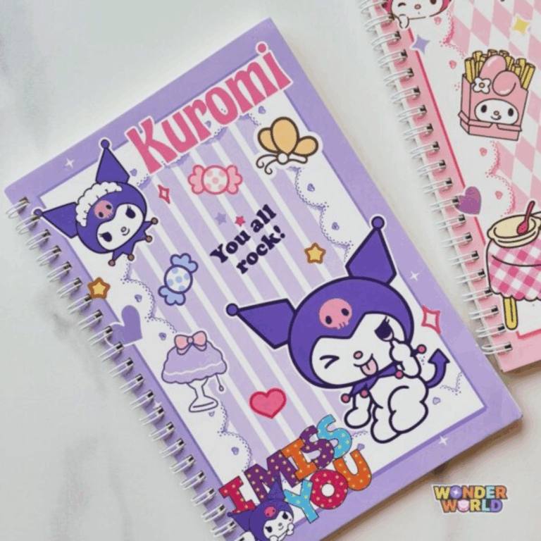 A lavender spiral notebook featuring a center panel of light purple and white vertical stripes. It shows a playful Kuromi winking and sticking her tongue out, surrounded by candies, a dessert stand, and the phrases "You all rock!" and a colorful, patterned "I MISS YOU" at the bottom