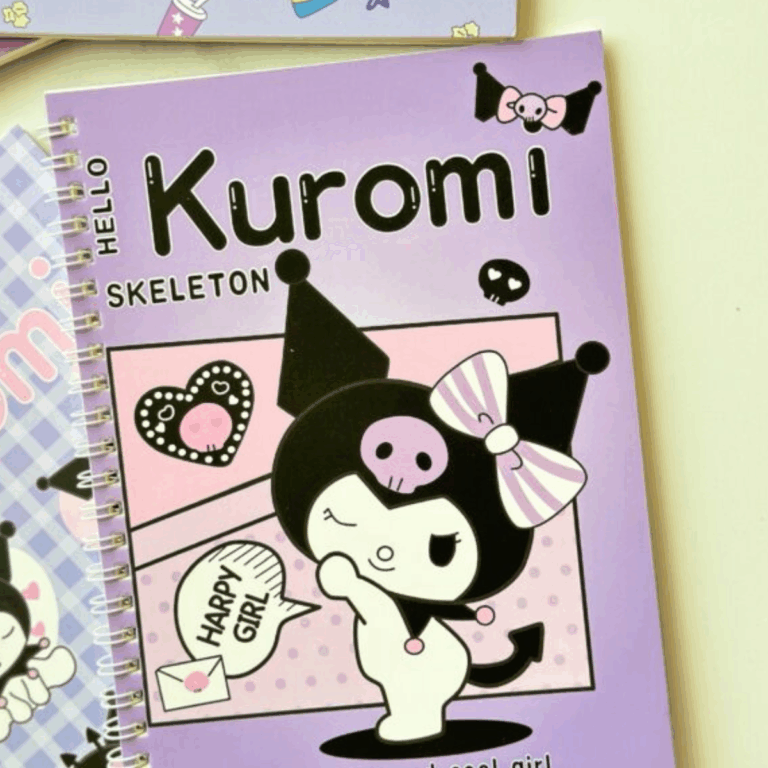 A purple spiral notebook featuring Kuromi winking while wearing a lavender and white striped bow, set against a pink polka-dot frame with a comic-style speech bubble that reads "HAPPY GIRL" next to a small letter envelope
