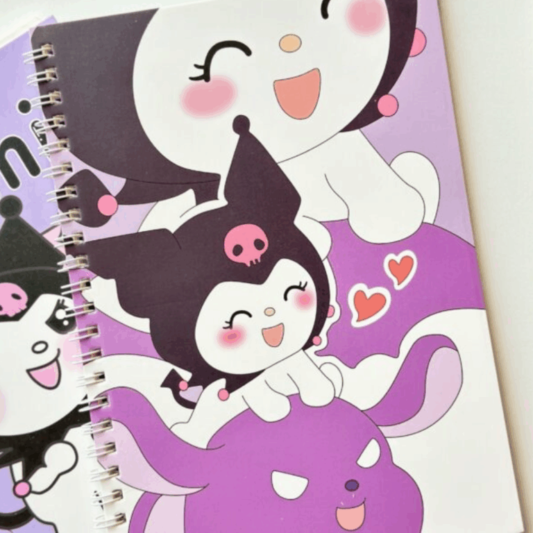 A lavender and deep purple spiral notebook showcasing a multi-layered illustration of a smiling Kuromi with rosy pink cheeks, accompanied by Baku and floating orange hearts against a two-tone purple backdrop